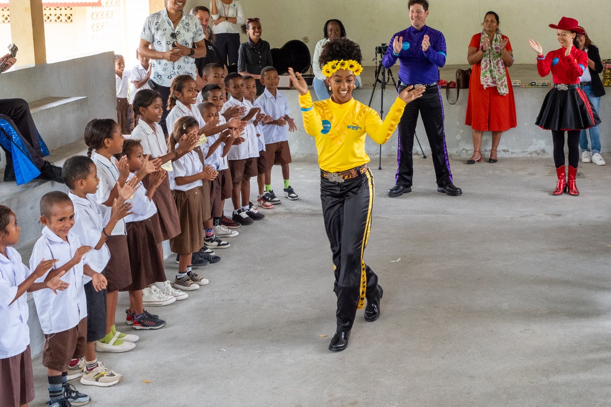 The children clapped, sang, laughed and danced to all the performances by the musical group.