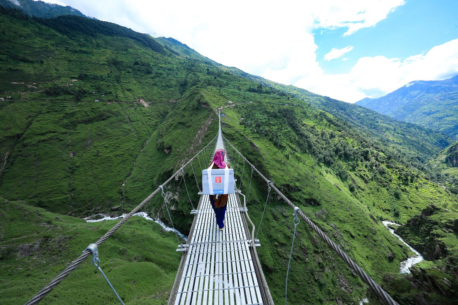 On 3 August 2021 in Darchula District in Nepal's remote far-west, Birma Devi Kunwar takes Johnson & Johnson COVID-19 vaccines