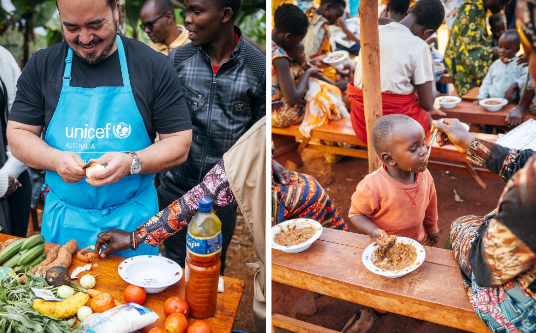 A man cooking and a young boy eating food.