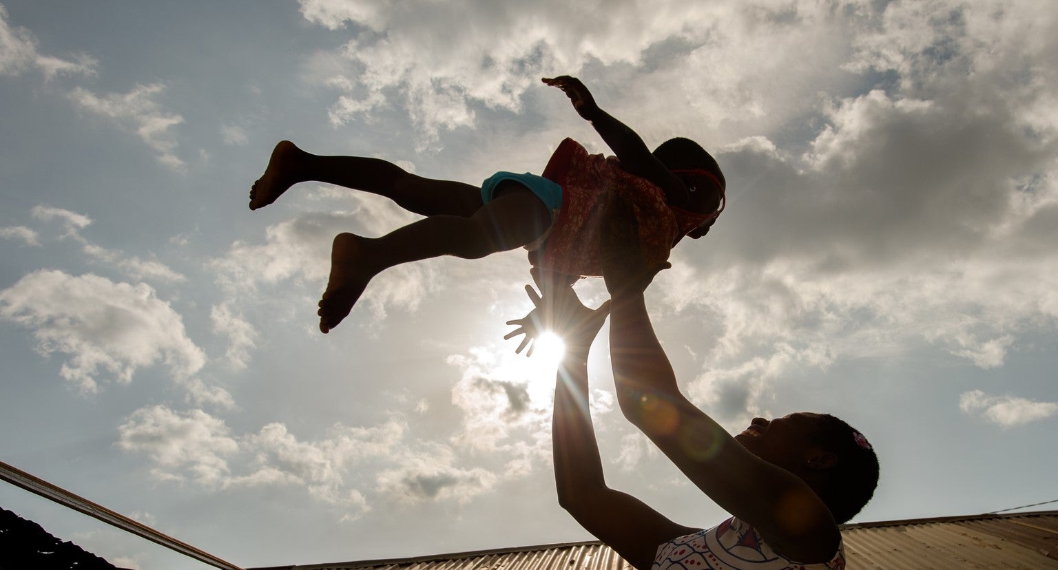 A mother and her child playing