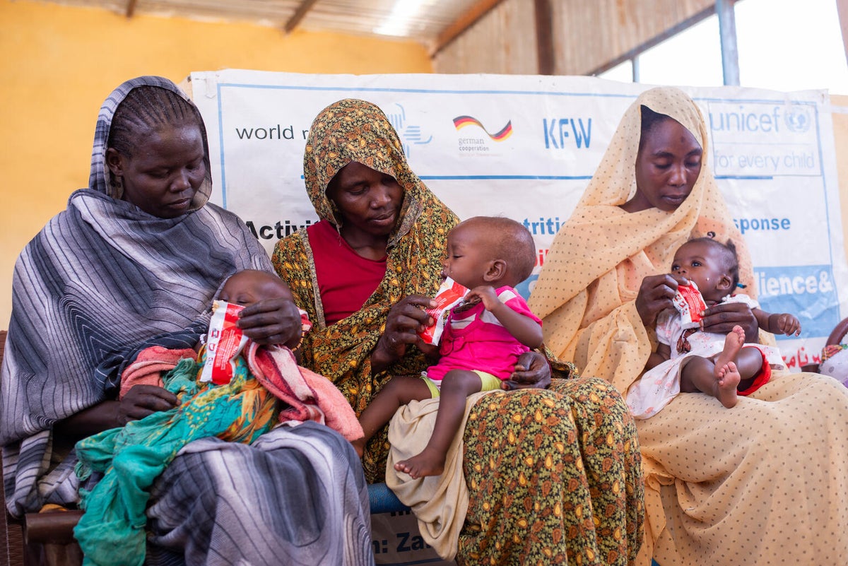 Mothers receive health and nutrition treatment and services for their babies at a UNICEF-supported health facility at a camp for internally displaced people. 