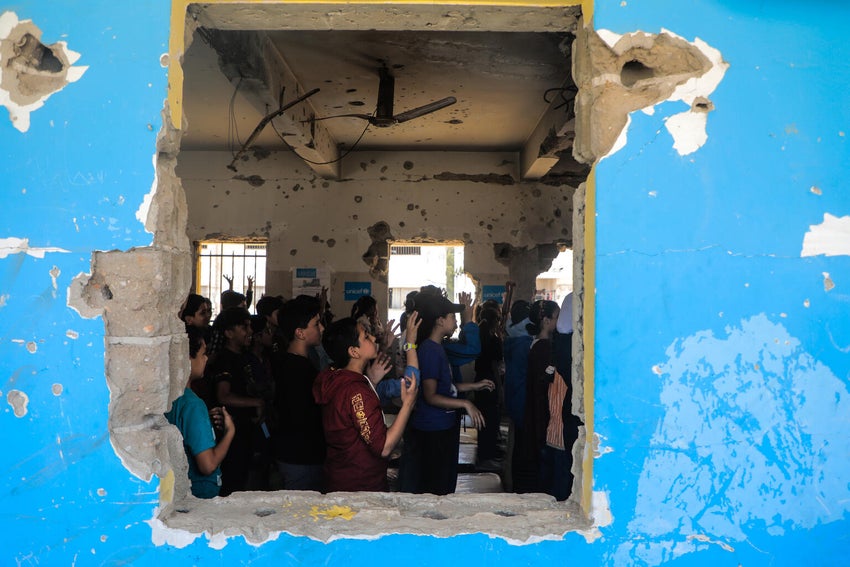 In Gaza, children attend a puppet show – an engaging and child-friendly method to teach children how to recognise, avoid, and report dangerous objects.