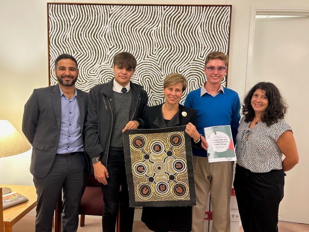 A delegation from UNICEF Australia poses with Assistant Minister for Climate Change and Energy Jenny McAllister in Parliament House, Canberra. 