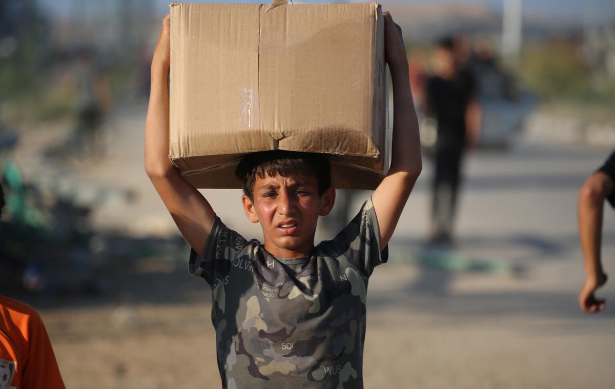 Fadi, 13, also risks his life to help his family in the Gaza Strip.