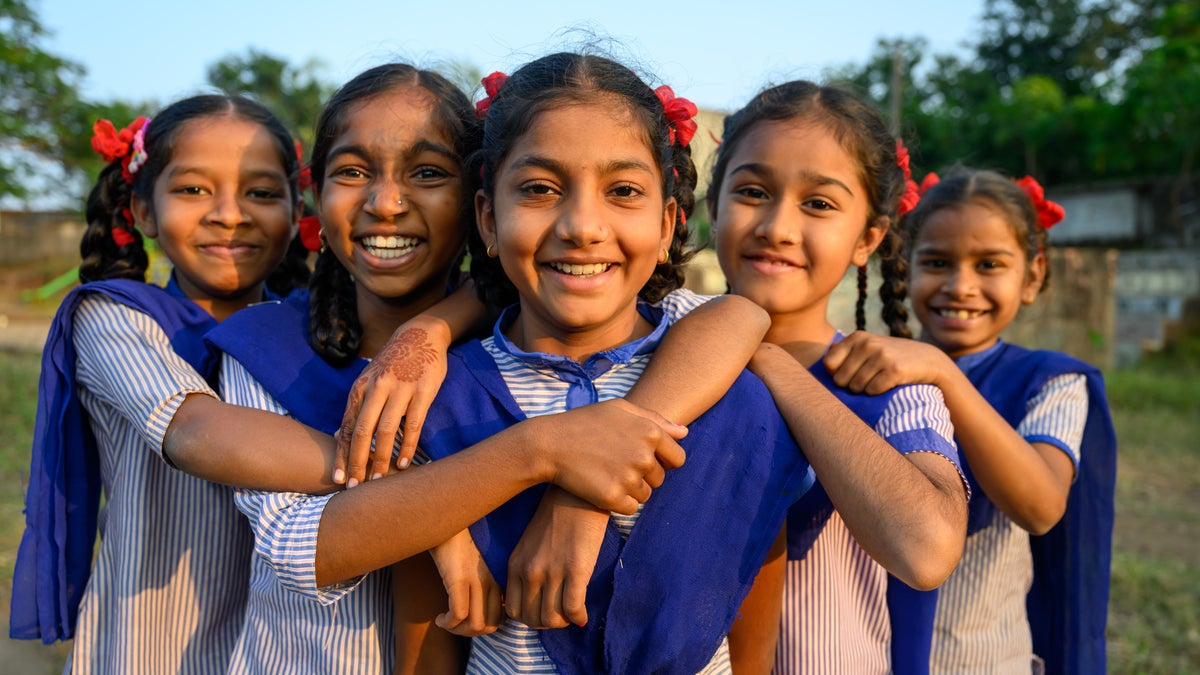 A girl reading a children's book