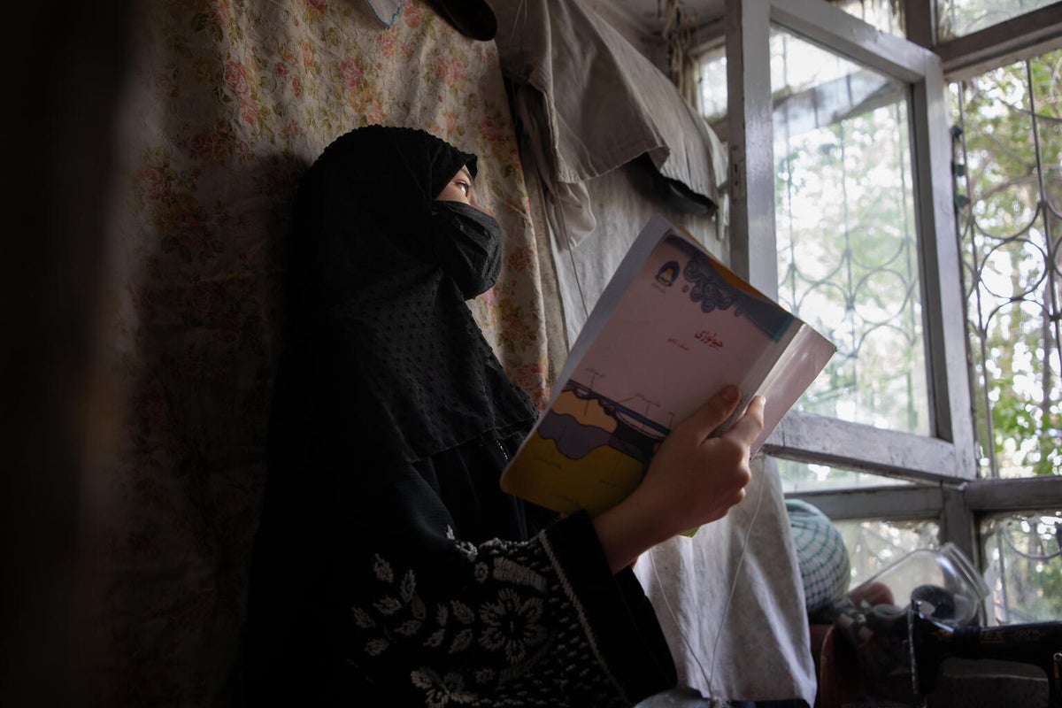 Shafiqa, 15, finds ways to keep learning, even when classrooms have been shut to her.