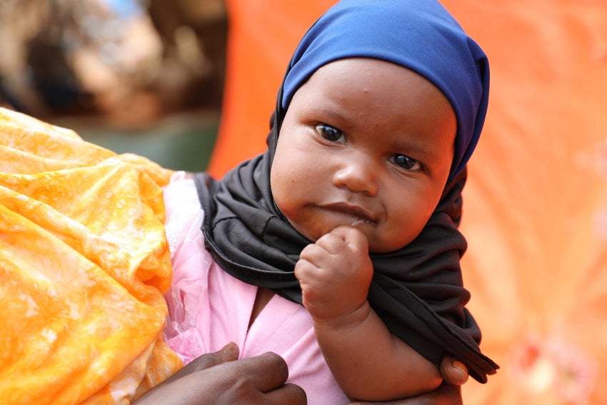 Children participating in a UNICEF-supported vaccination campaign against polio.