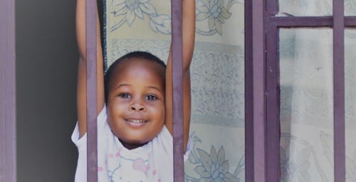 Child looking out window