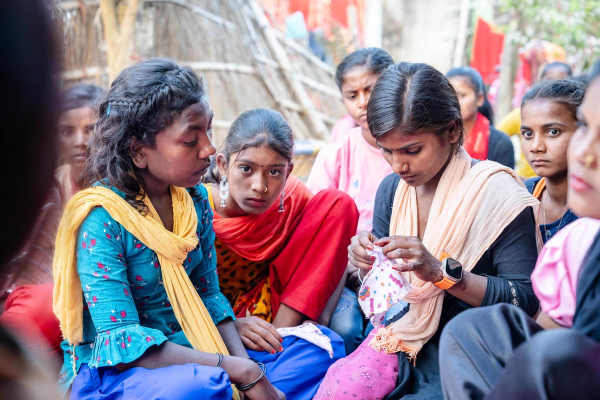 In Nepal, girls are taught how to make sanitary pads and learn about menstruation hygiene practices. 