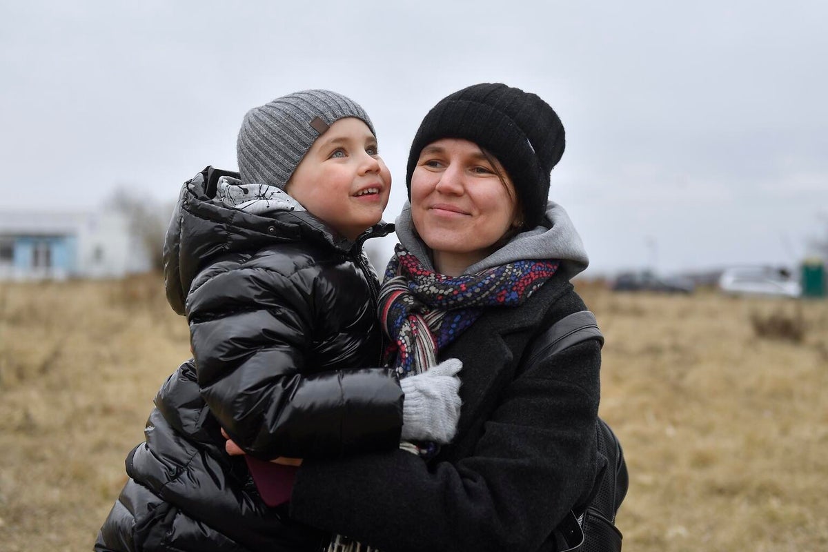 Child with his mother in winter clothing