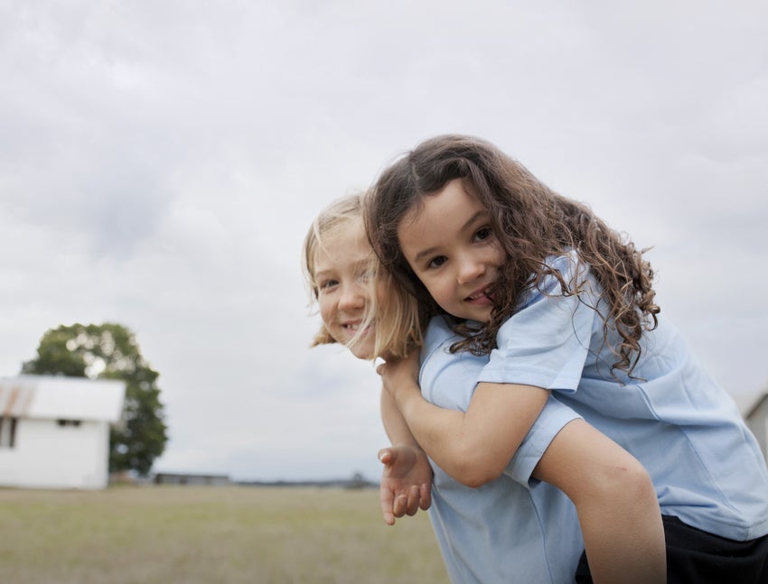 Two girls looking at the camera