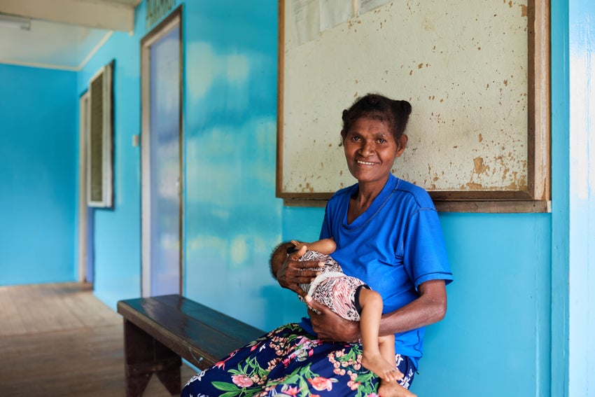 A mother and her son visit a UNICEF-supported health care centre.