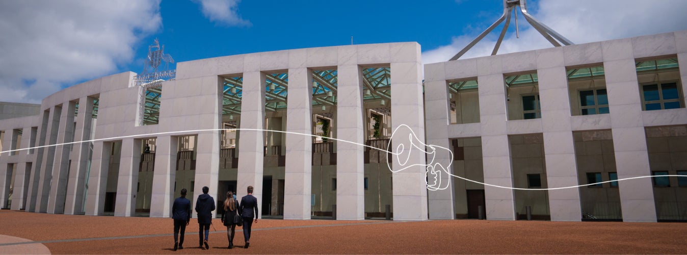 A group of students entering Parliament House.