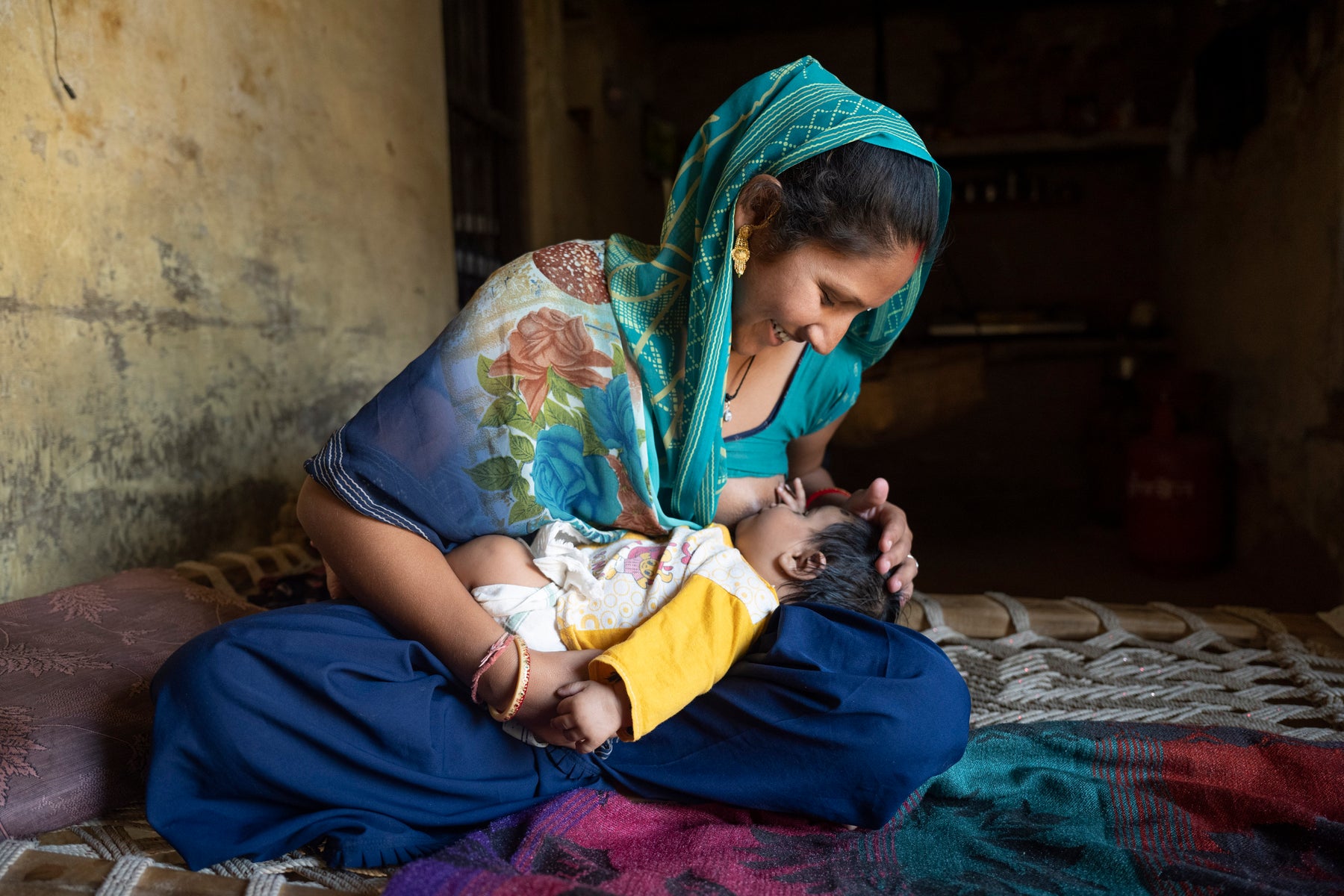 Mother feeding her baby