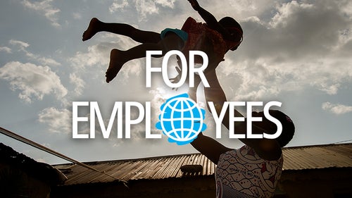 A mother and her child playing.