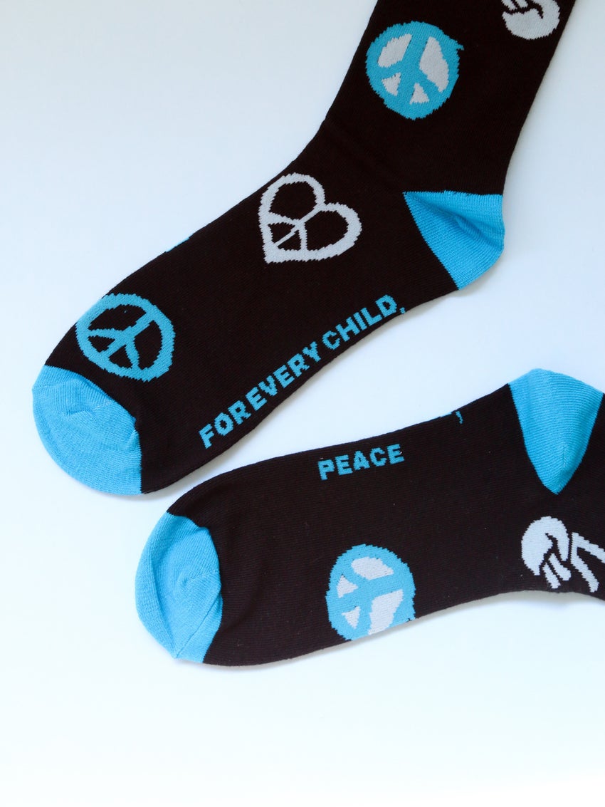 A pair of UNICEF Australia 'Peace' socks from the Sydney Sock Project
