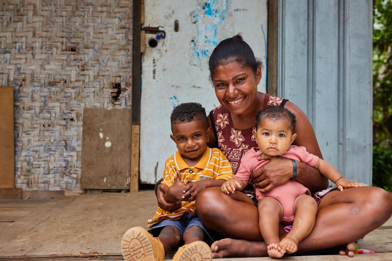 A mother and her two children in Papua New Guinea