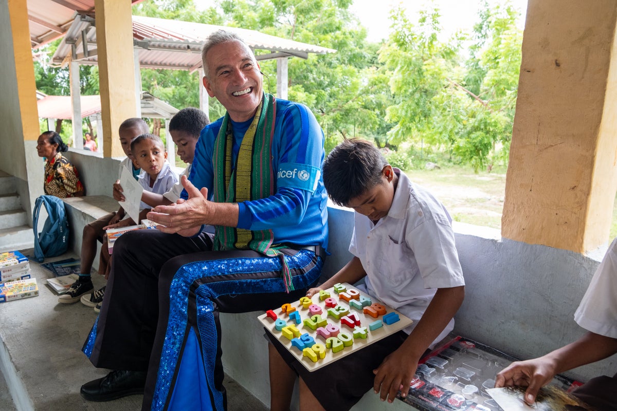 Big smiles as one of the students finishes a puzzle.