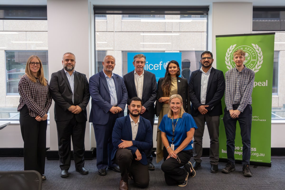 Group photo of staff from UNICEF Australia and Human Appeal Australia.