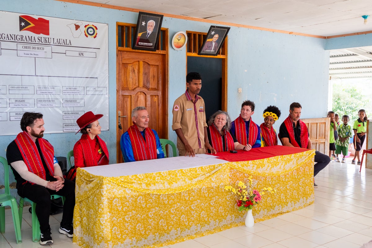 A group of people seated at a table. 