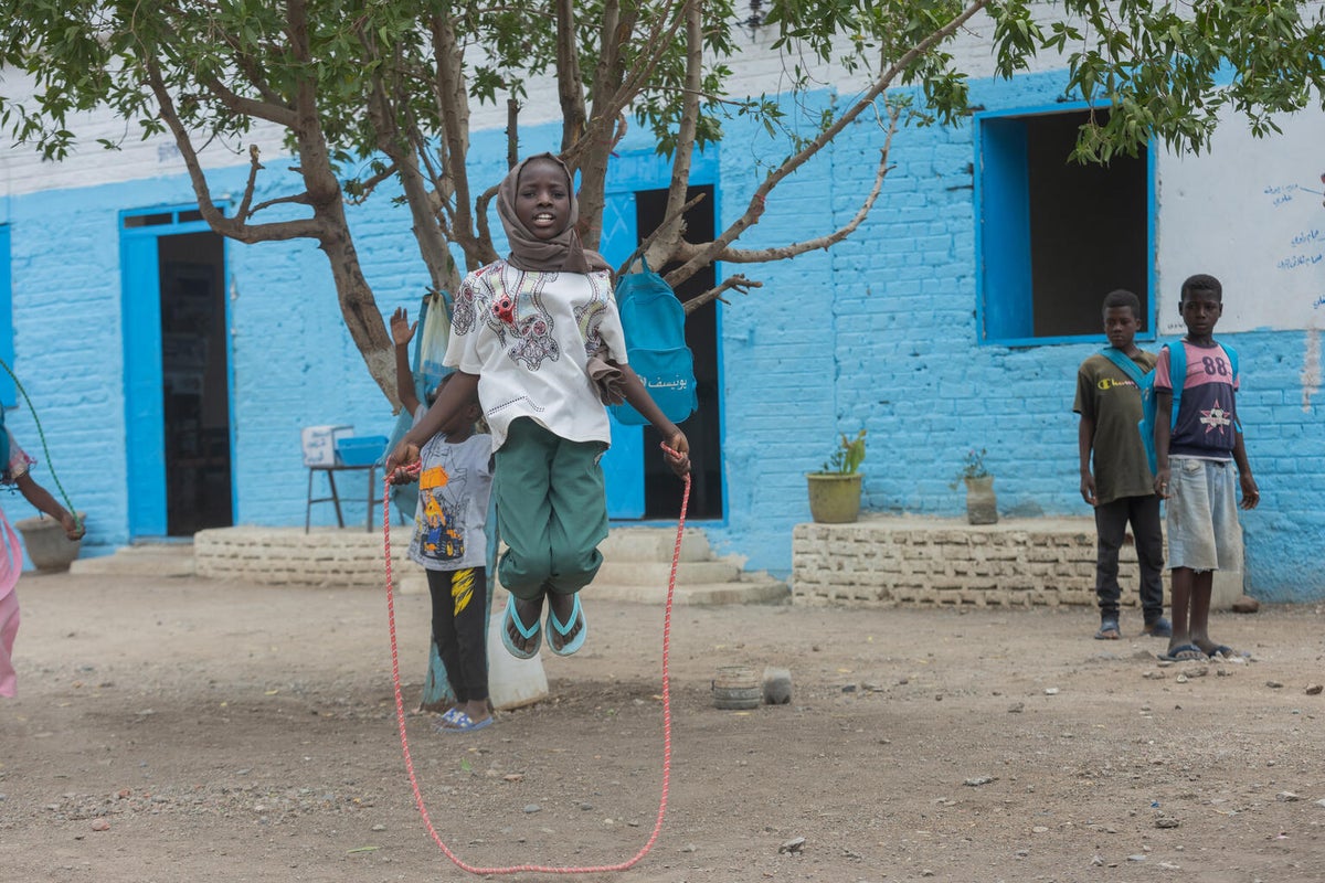 At a UNICEF-supported safe learning space, 11-year-old Rabha skips a rope, her favourite game. 