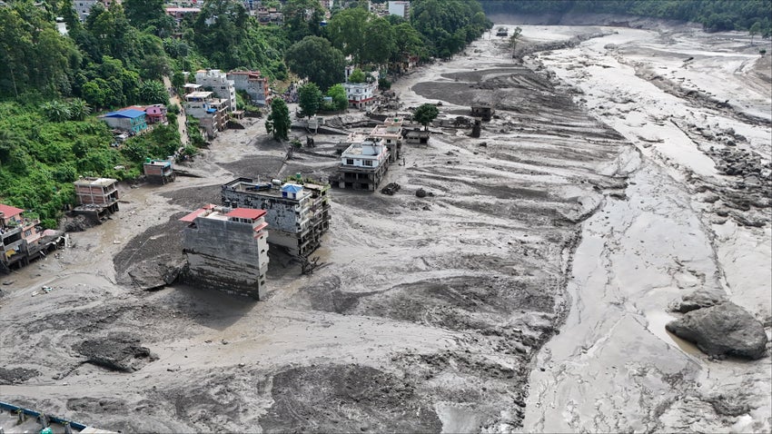 Views of settlements in central northern Nepal covered in mud following the devastating flash floods.