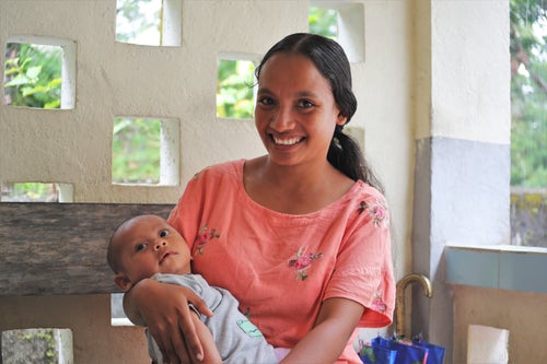 Mother with child in Timor-Leste