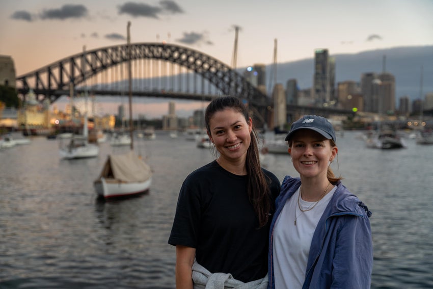Two walkers with Sydney Harbour in the background