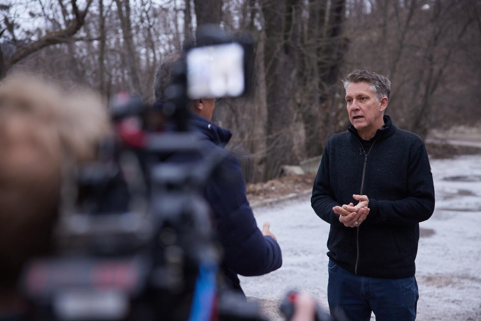 Man in front of camera