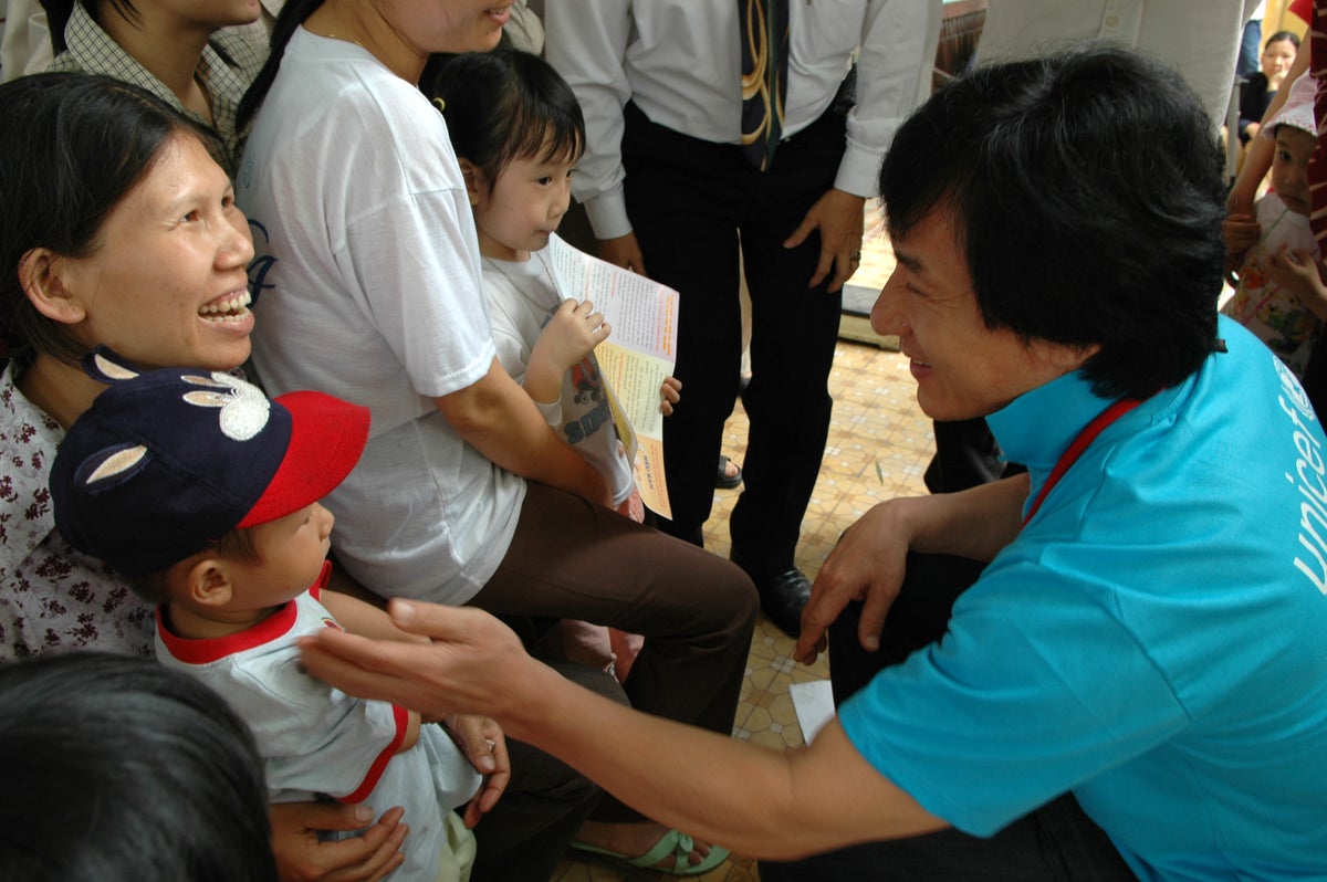 Jackie Chan visits a UNICEF-supported health centre in Vietnam.