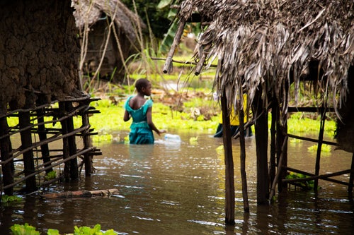 In photos: Floods hit communities around the world