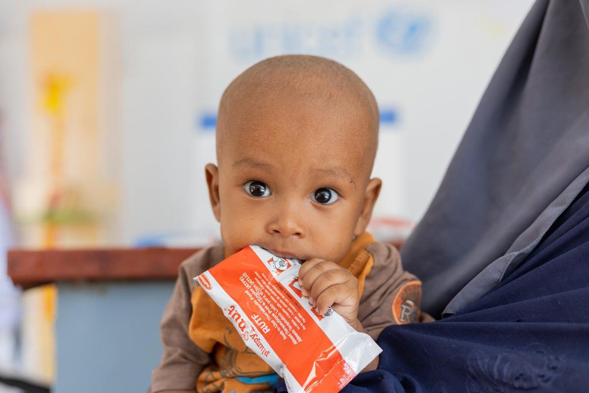 As conflict rages on in Sudan, a displaced mother of six children brings her youngest to a UNICEF-supported health facility so that he can receive treatment for malnutrition.  