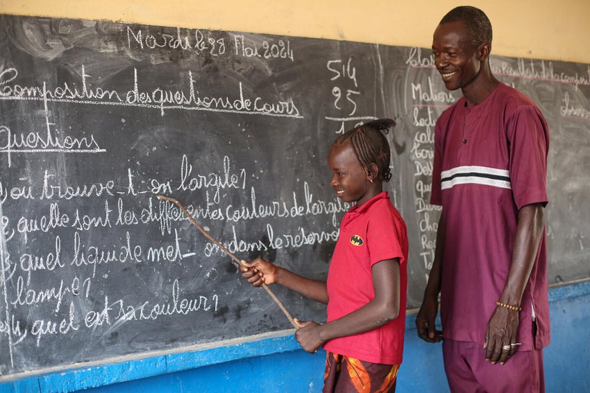 A young girl attending school in Mali