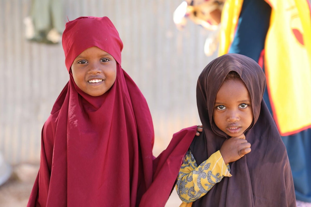 Children participating in a UNICEF-supported vaccination campaign against polio.