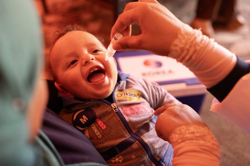 A child receiving vaccination.
