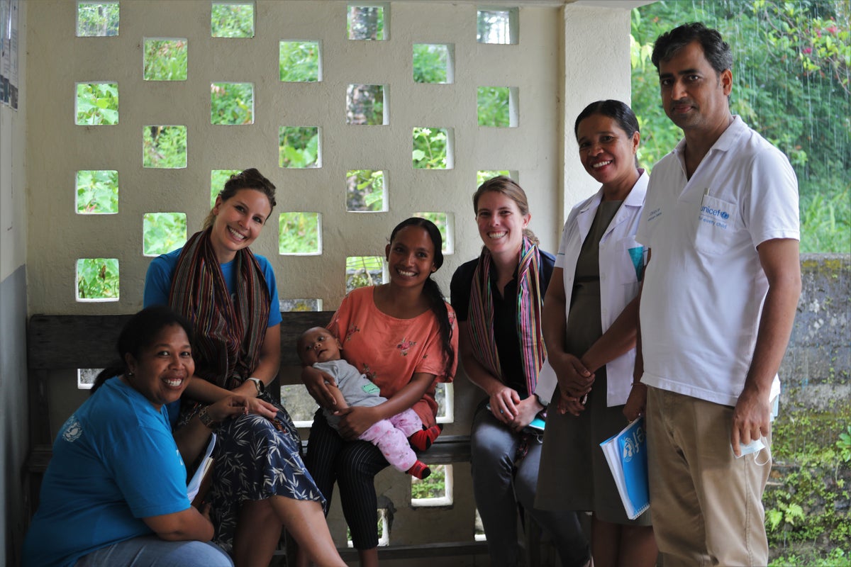 UNICEF team with family at CHC