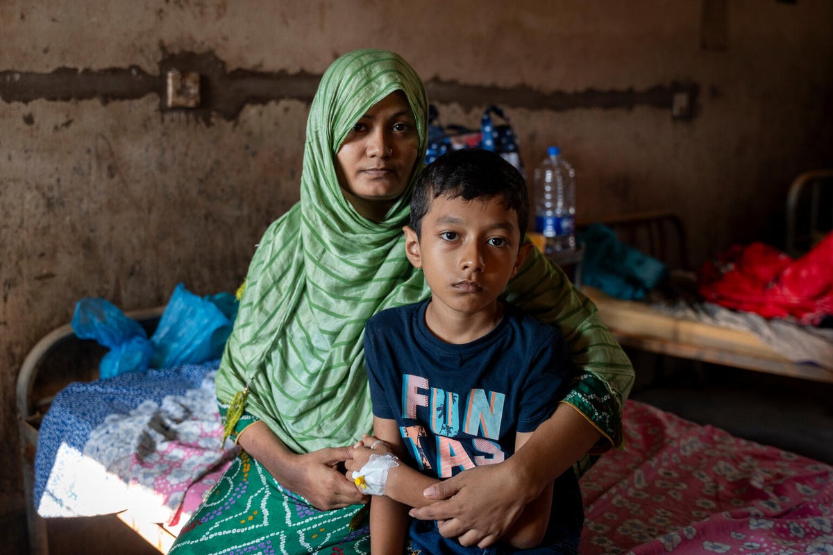 A mother and her son impacted by the flooding in Bangladesh