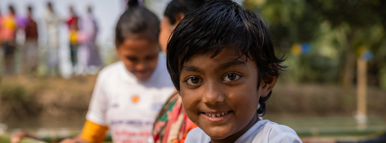 A young boy participates in swimming sessions at the UNICEF-supported SwimSafe programs in Bangladesh.