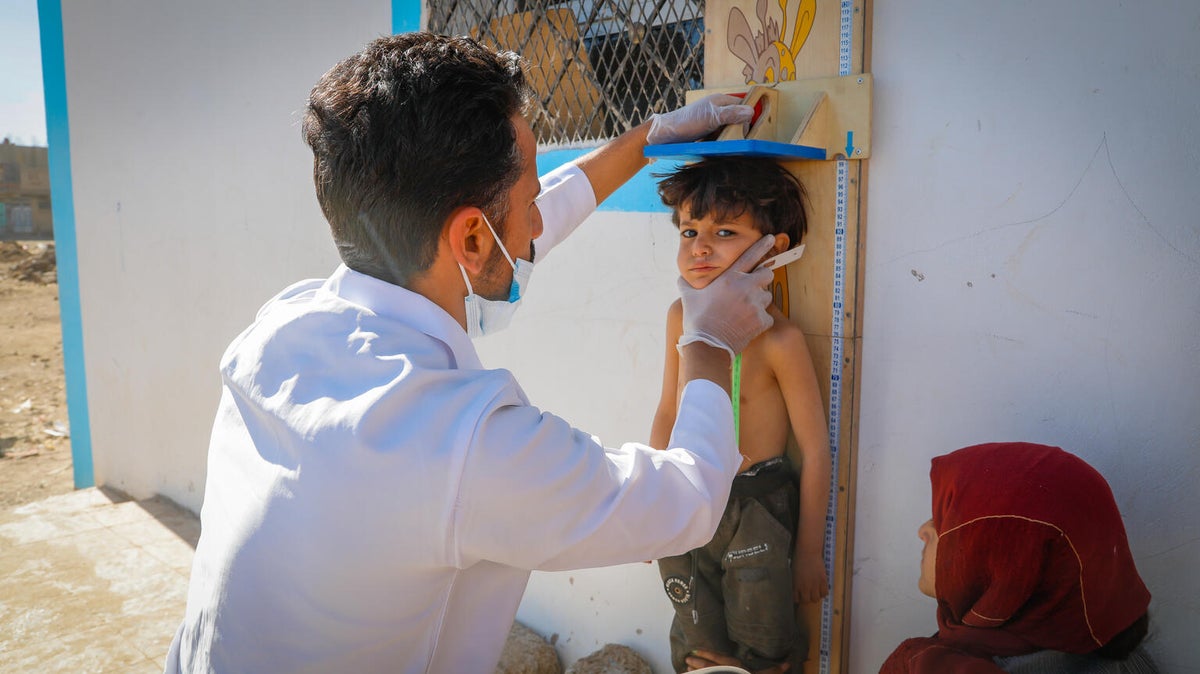 A four-year-old boy is being monitored for malnutrition at the UNICEF-supported mobile clinic. 