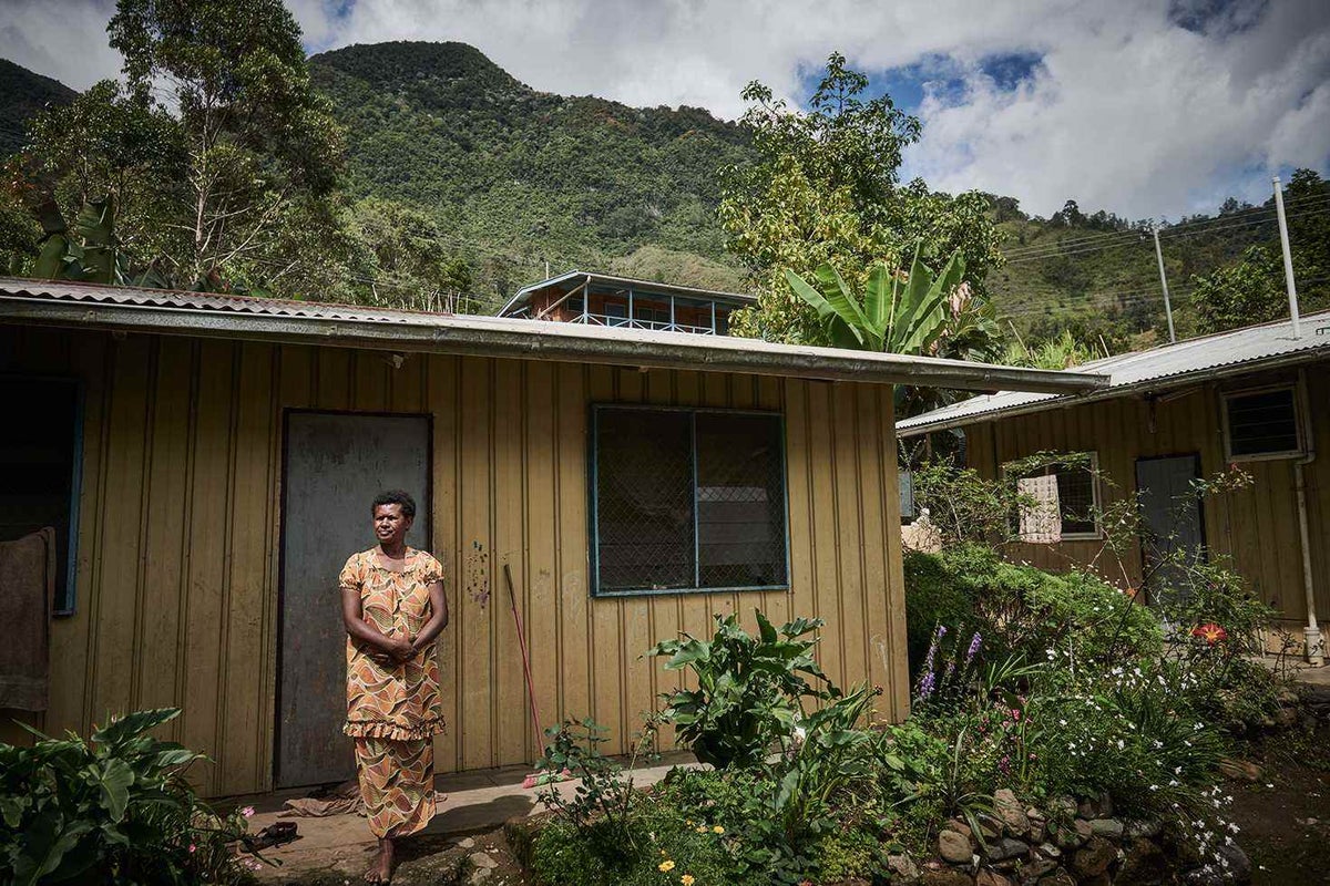 Wasna outside her home in the mountain village of Goglme, Chimbu
