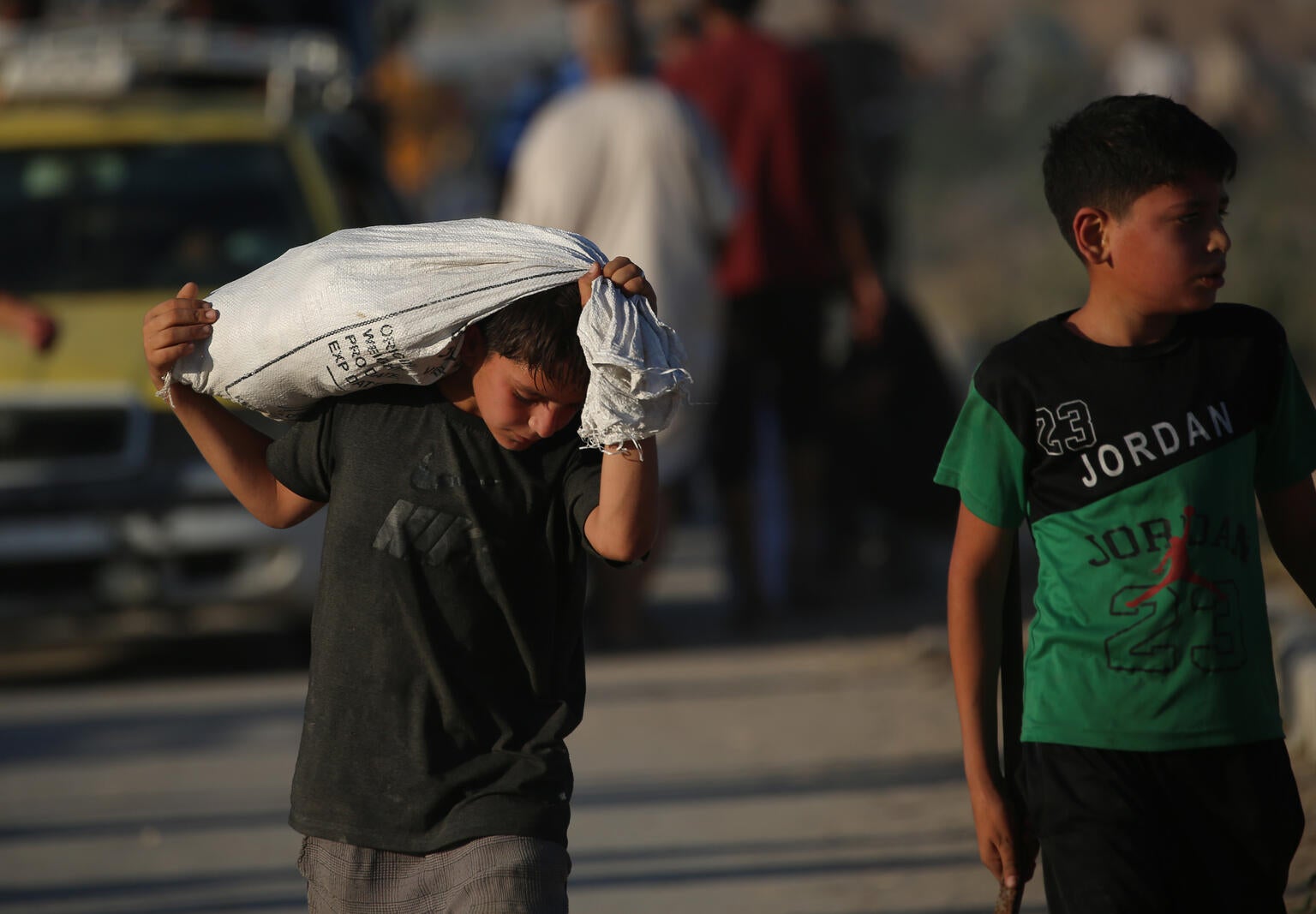 Families risk their lives to access humanitarian aid in the Gaza Strip