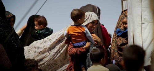 Mother holding child