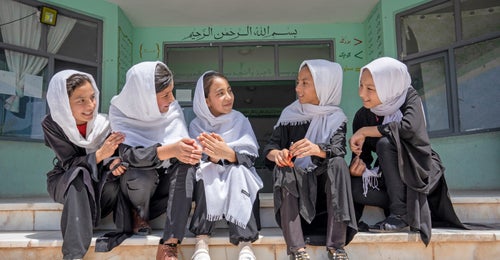 Children at school exercising their rights to education 