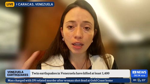 Woman talks to camera