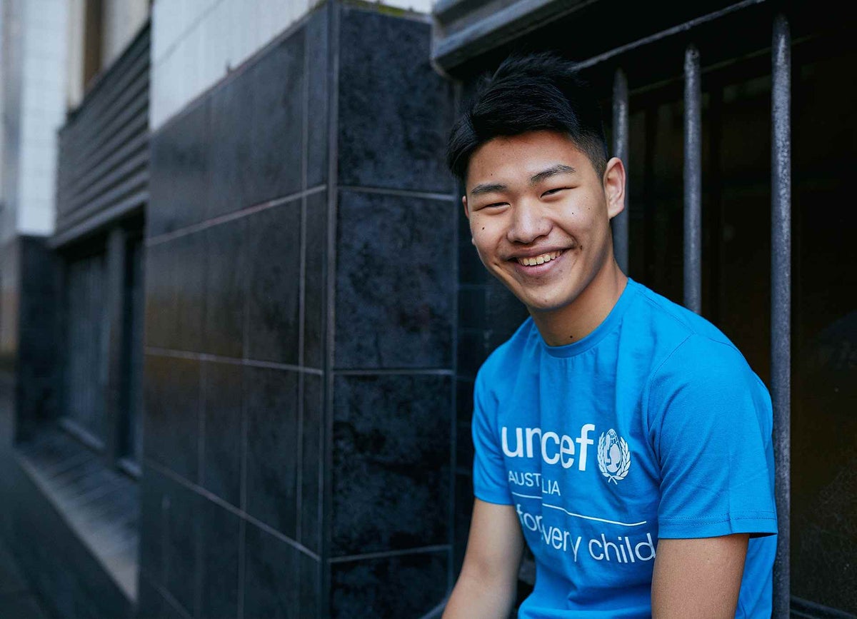 Brian smiles to camera