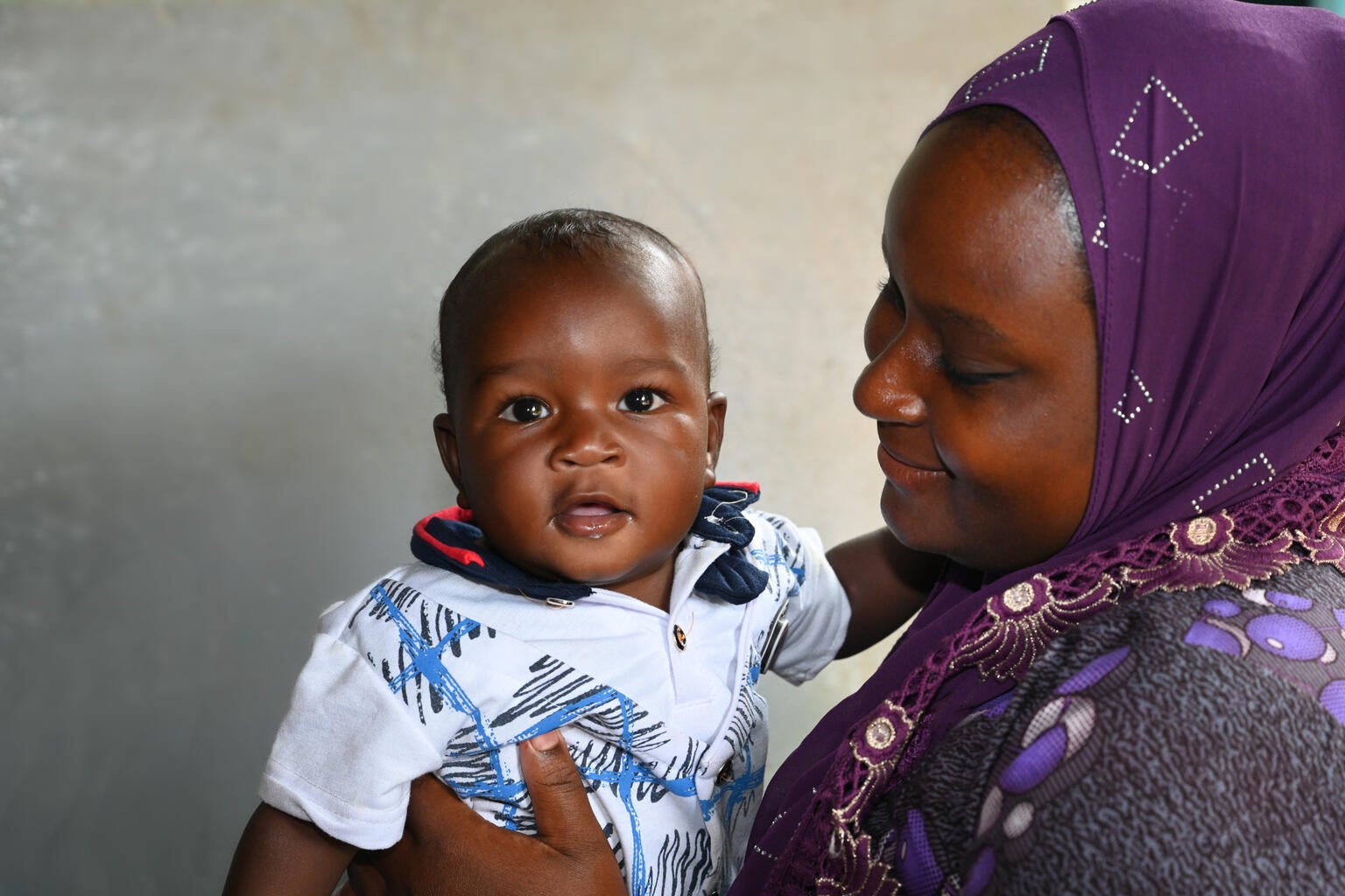 Mother smiling at her baby