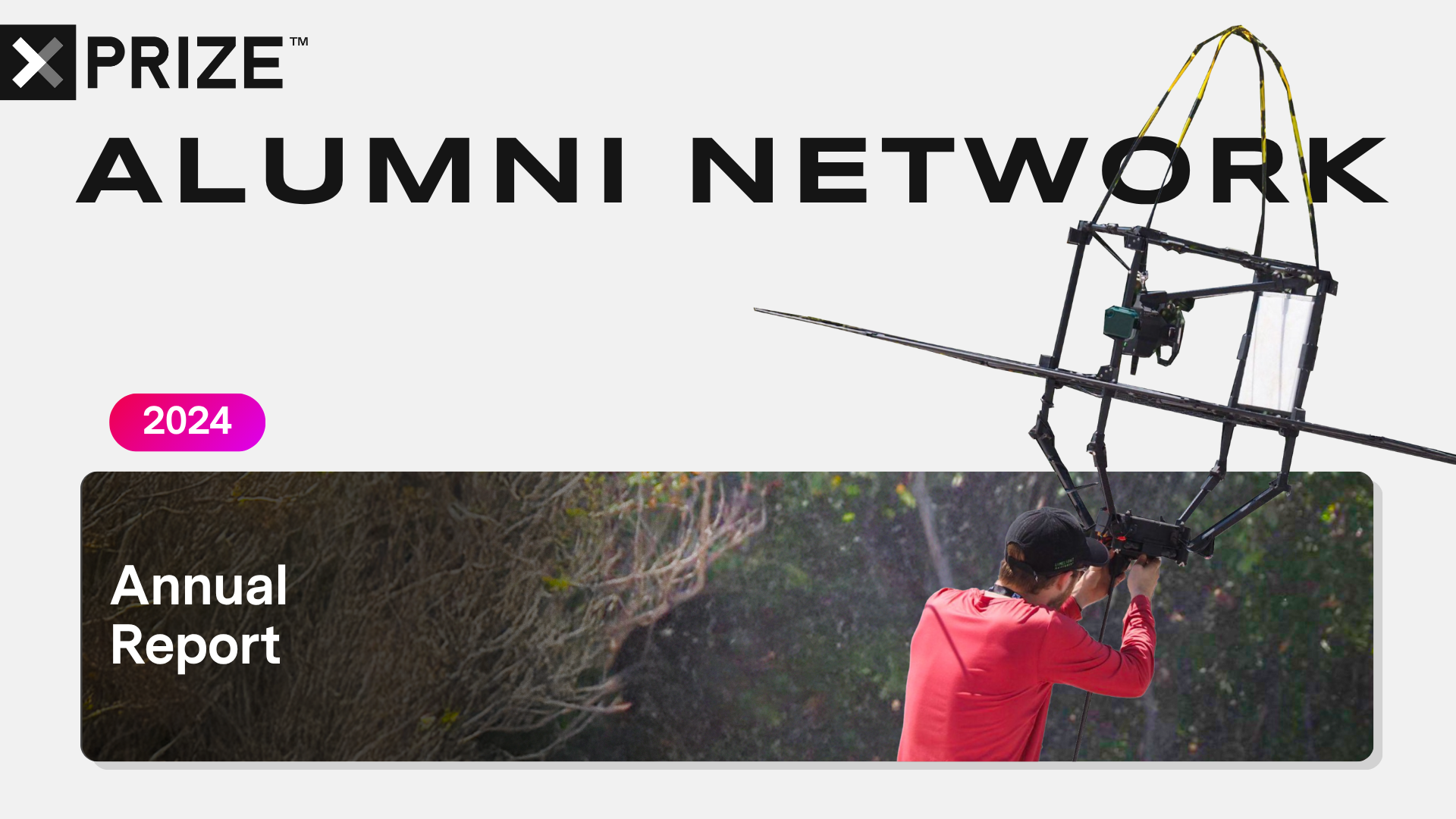 An XPRIZE Rainforest alumnus lifting a drone in the Amazon.