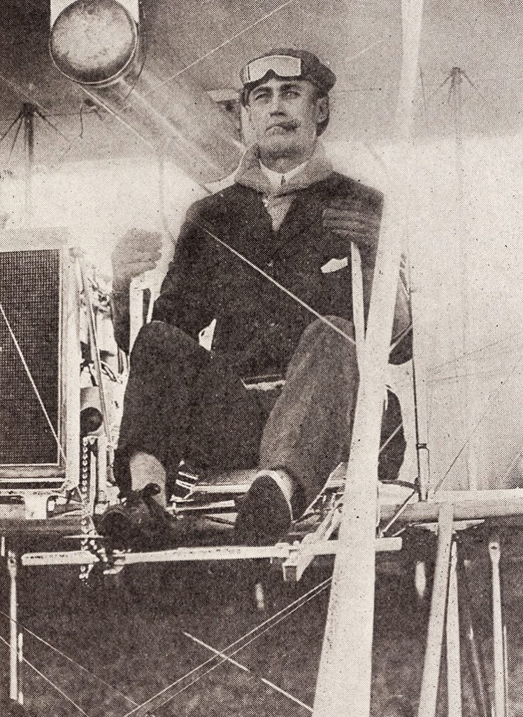 Cal Rogers at the controls of a Wright Model EX built by Orville and Wilbur for the fight. It was named Vin Fiz by Rogers’ sponsor, Armor Meat Packing Company, that used the flight to advertise their new grape-flavored soft drink, Vin Fiz “Calbraith Rogers Makes His Last Flight.” Fly Magazine, vol. 4, no. 7, 1912. View Source.