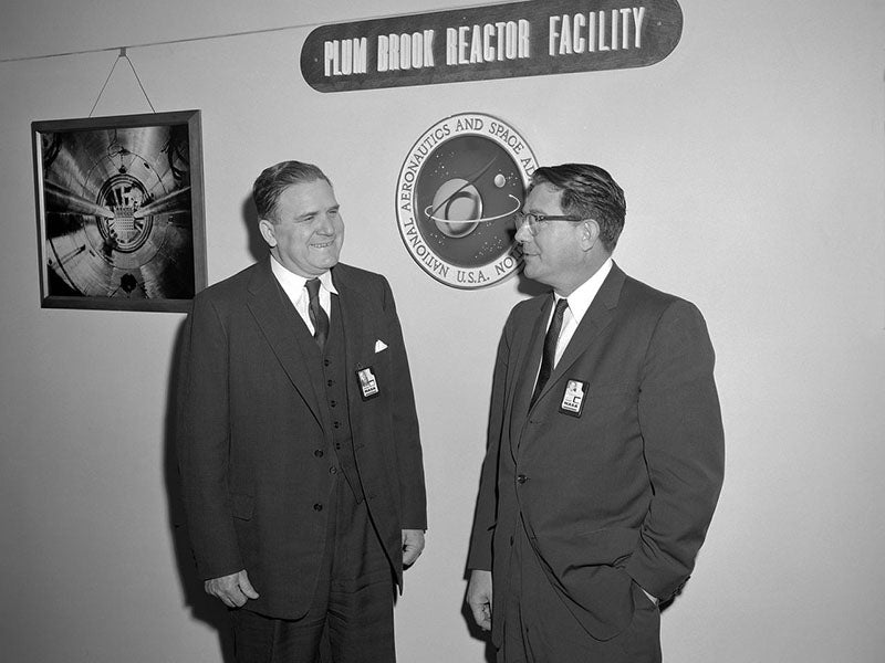 The second NASA Administrator James Webb (left), wih Abe Silverstein, the new Director of the NASA Lewis Research Center. The NASA seal, which is different from the NASA logo, is on the wall between them (nasa.gov/people)