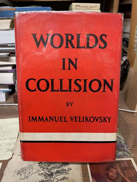 Dust jacket of Worlds in Collision, by Immanuel Velikovsky, Macmillan Co., 1st ed., 1950, a copy offered for sale by Chamblin Bookmine (chamblinbookmine.com)